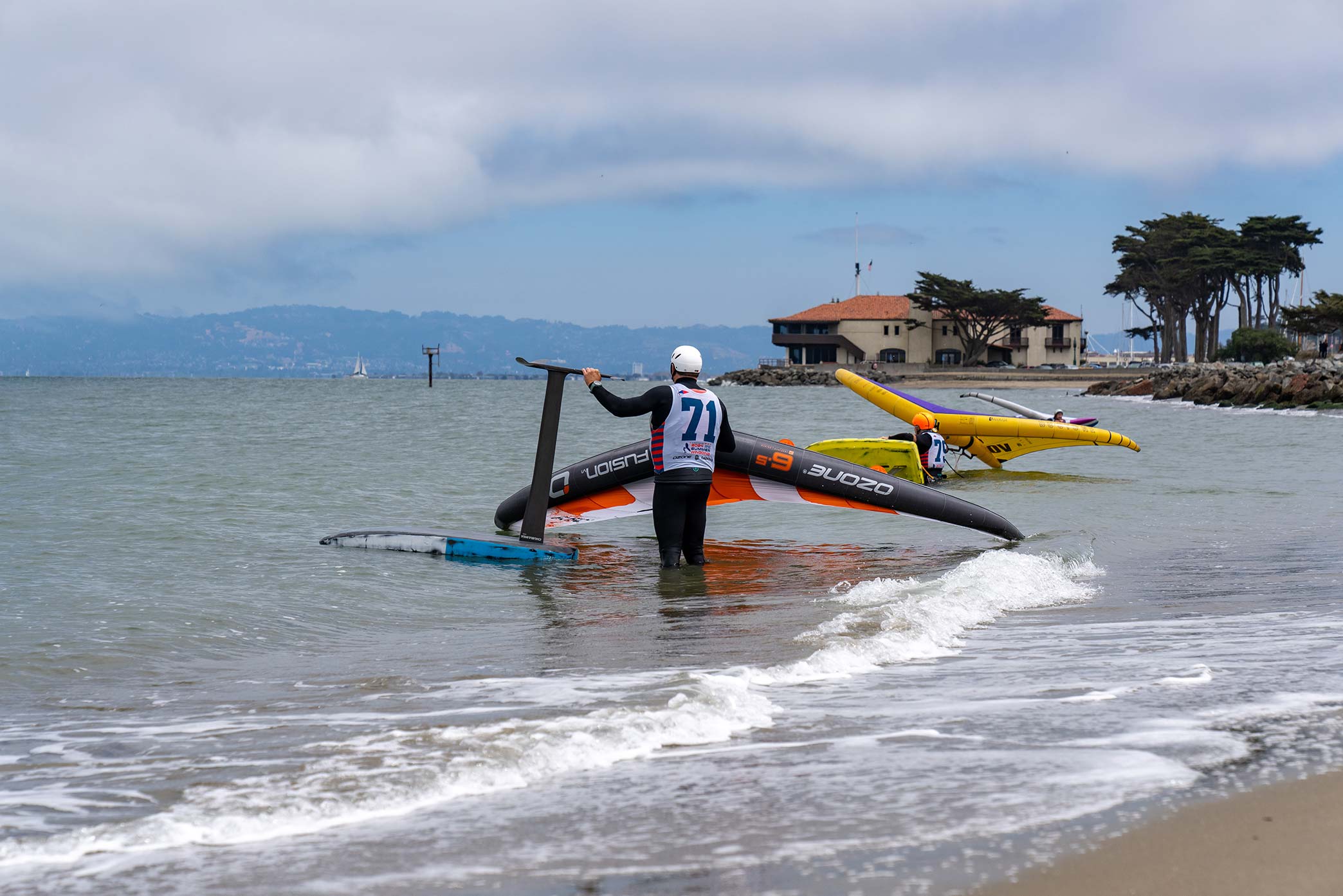 Here is a paragraph on why Crissy Field in San Francisco is best for an intermediate wingfoiler to hire an instructor: Crissy Field in San Francisco is one of the most challenging and dynamic locations for wingfoiling in the Bay Area, making it an ideal spot for intermediate riders to work with a qualified instructor. The strong, variable winds, complex current patterns, heavy boat traffic, and difficult launch and landing conditions at Crissy Field require specialized knowledge and skills to navigate safely. An experienced instructor can help an intermediate wingfoiler understand the unique hazards of this iconic spot, such as sudden wind shifts, unpredictable swell, and navigating through the busy commercial shipping channel. By hiring a local expert who knows the nuances of Crissy Field, the intermediate rider can learn the proper safety protocols, develop risk assessment strategies, and build the confidence needed to tackle these more advanced conditions. Working with an instructor is the best way for an intermediate wingfoiler to progress their skills and riding abilities in the demanding environment of Crissy Field.